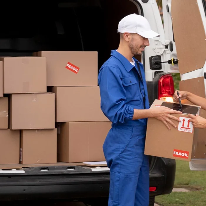 tumb 3 full-shot-man-delivering-box